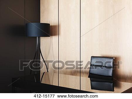Desk and lamp in modern office View Large Photo Image Stock Photo - Desk and lamp in modern office. Fotosearch