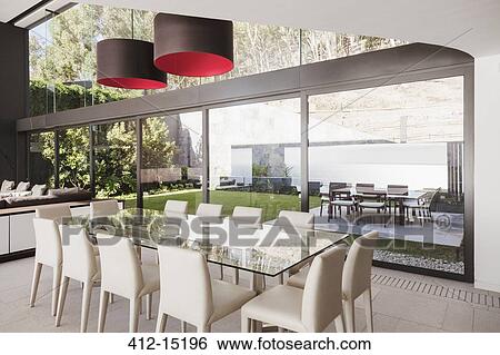 Dining room in modern house View Large Photo Image Stock Photograph - Dining room in modern house. Fotosearch