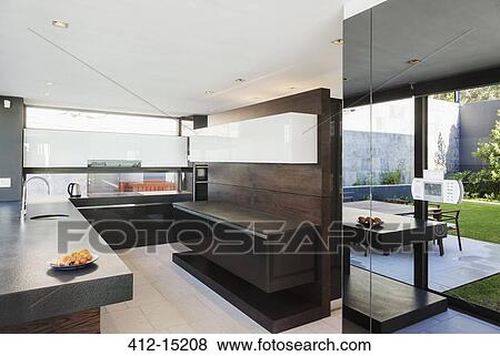 Stock Photo - Kitchen in modern house. Fotosearch