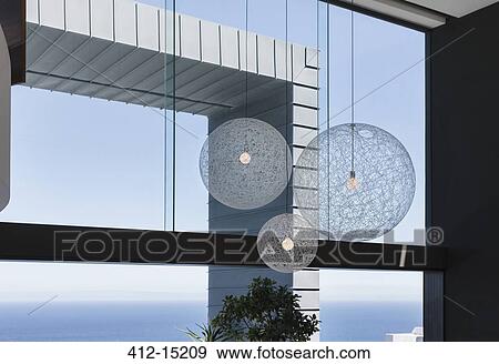 Stock Photo - Light fixtures in modern house. Fotosearch
