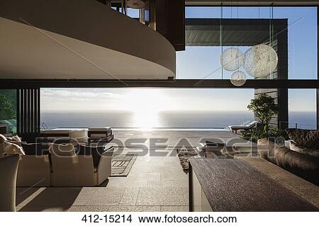 Modern house overlooking ocean View Large Photo Image Picture - Modern house overlooking ocean. Fotosearch