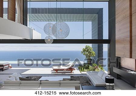 Modern house overlooking ocean View Large Photo Image Stock Photography - Modern house overlooking ocean. Fotosearch