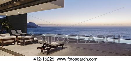 Modern patio and infinity pool overlooking ocean at sunset View Large Photo Image Stock Photography - Modern patio and infinity pool overlooking ocean at sunset. Fotosearch