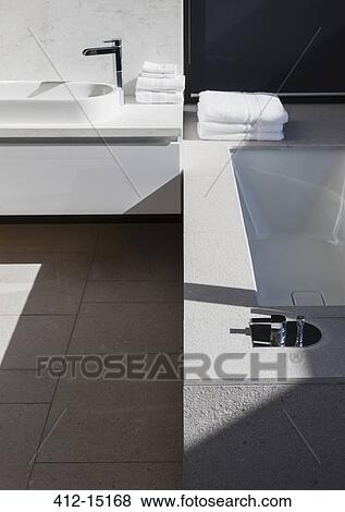 Sinks and bathtub in modern bathroom View Large Photo Image Stock Photo - Sinks and bathtub in modern bathroom. Fotosearch