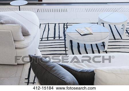 Sofa and coffee tables in modern living room View Large Photo Image Picture - Sofa and coffee tables in modern living room. Fotosearch
