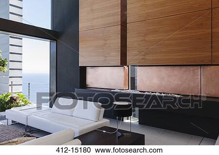Sofa and wood paneling in modern living room View Large Photo Image Stock Image - Sofa and wood paneling in modern living room. Fotosearch