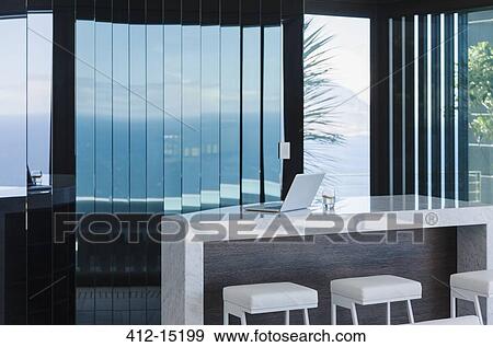 Stools and counter in modern house View Large Photo Image Stock Photo - Stools and counter in modern house. Fotosearch