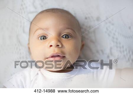 Close up of baby boy's face View Large Photo Image Stock Photo - Close up of baby boy's face. Fotosearch