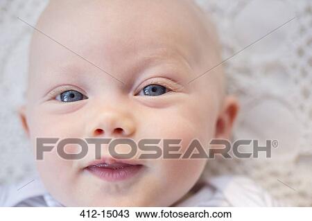 Close up of baby girl's face View Large Photo Image Stock Image - Close up of baby girl's face. Fotosearch