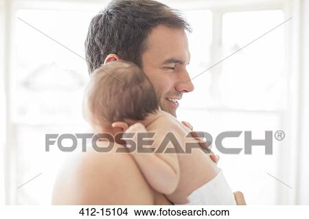 Father holding baby girl View Large Photo Image Picture - Father holding baby girl. Fotosearch