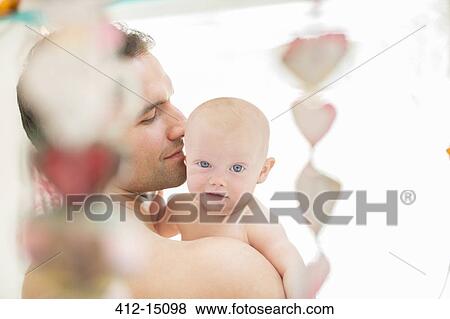 Father holding baby girl View Large Photo Image Stock Photo - Father holding baby girl. Fotosearch