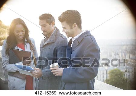 Business people talking outdoors View Large Photo Image Stock Photo - Business people talking outdoors. Fotosearch