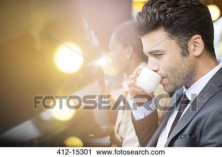 Businessman at sidewalk cafe View Large Photo Image Stock Image - Businessman at sidewalk cafe. Fotosearch