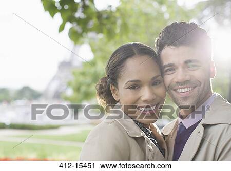 Couple hugging in park View Large Photo Image Stock Image - Couple hugging in park. Fotosearch
