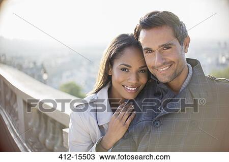 Couple hugging outdoors View Large Photo Image Stock Image - Couple hugging outdoors. Fotosearch