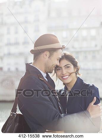 Couple hugging outdoors View Large Photo Image Stock Photo - Couple hugging outdoors. Fotosearch