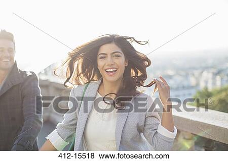 Stock Photo - Couple running outdoors. Fotosearch