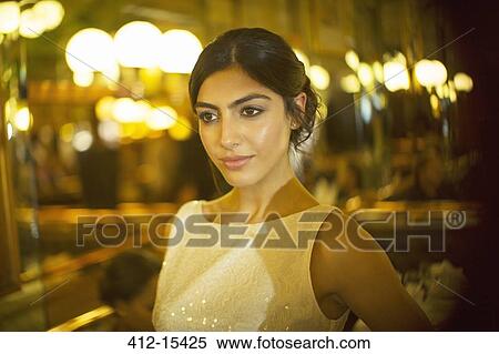 Stock Photography - Serious woman in dress. Fotosearch