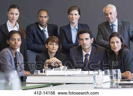 Business people sitting in meeting View Large Photo Image Stock Photograph - Business people sitting in meeting. Fotosearch