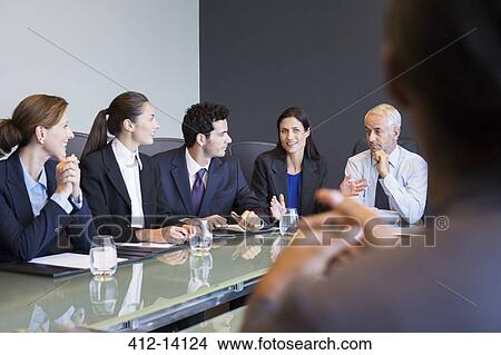 Business people talking in meeting View Large Photo Image Picture - Business people talking in meeting. Fotosearch