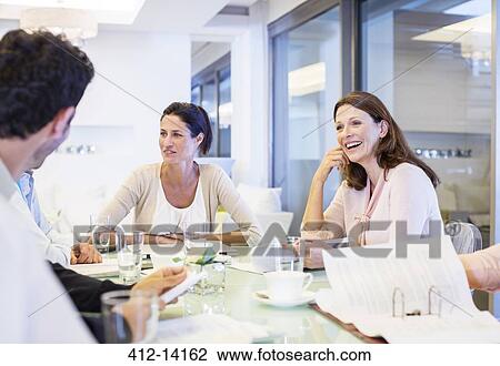 Business people talking in meeting View Large Photo Image Stock Image - Business people talking in meeting. Fotosearch