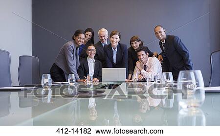 Business people using laptop in meeting View Large Photo Image Stock Image - Business people using laptop in meeting. Fotosearch