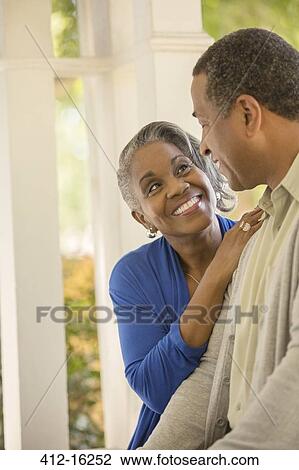 Happy senior couple hugging outdoors View Large Photo Image Stock Image - Happy senior couple hugging outdoors. Fotosearch