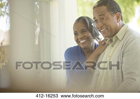 Stock Image - Happy senior couple outdoors. Fotosearch