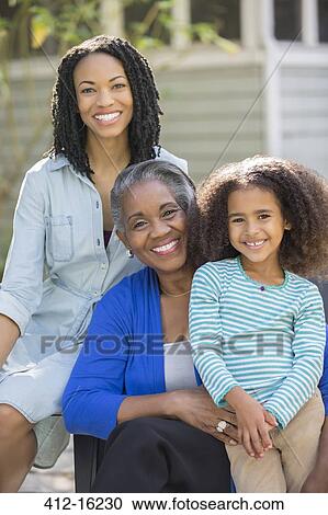 Portrait of smiling multi-generation women outdoors View Large Photo Image Stock Image - Portrait of smiling multi-generation women outdoors. Fotosearch