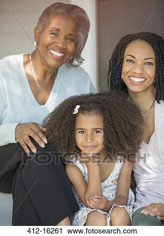 Portrait of smiling multi-generation women View Large Photo Image Stock Image - Portrait of smiling multi-generation women. Fotosearch