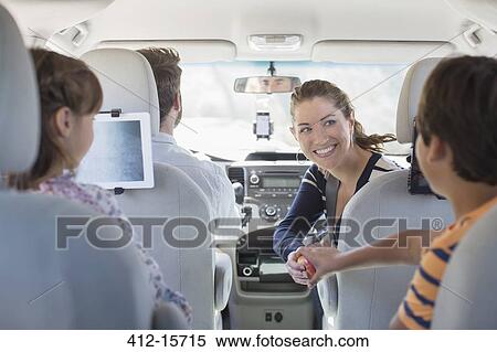 Family inside of car View Large Photo Image Stock Photography - Family inside of car. Fotosearch