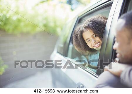Father and daughter leaning out car windows View Large Photo Image Stock Image - Father and daughter leaning out car windows. Fotosearch