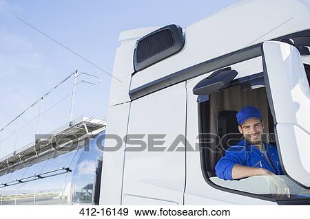 Portrait of smiling driver in milk tanker View Large Photo Image Stock Photo - Portrait of smiling driver in milk tanker. Fotosearch