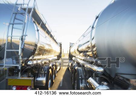 Stainless steel milk tankers side by side View Large Photo Image Stock Photograph - Stainless steel milk tankers side by side. Fotosearch
