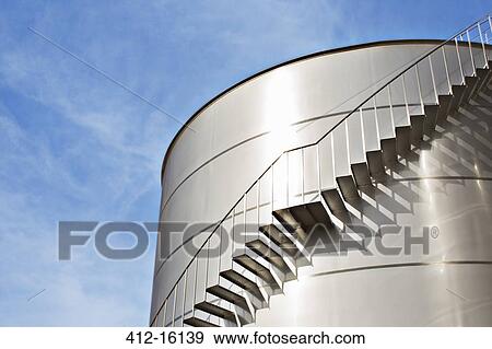 Stairs along silage storage tower View Large Photo Image Stock Photo - Stairs along silage storage tower. Fotosearch