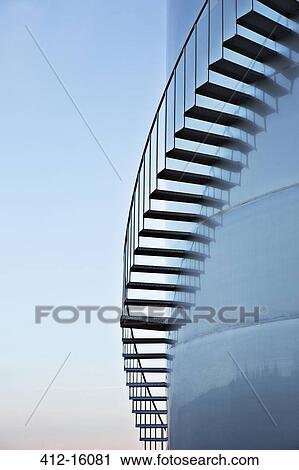 Steps winding around silage storage tower View Large Photo Image Stock Image - Steps winding around silage storage tower. Fotosearch