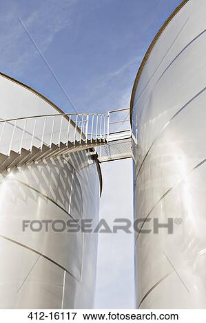Sun reflecting on silage storage tower View Large Photo Image Stock Photo - Sun reflecting on silage storage tower. Fotosearch