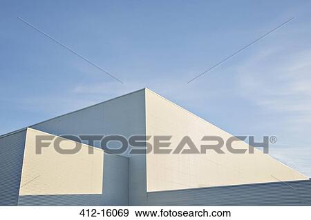 Sun shining on buildings against blue sky View Large Photo Image Stock Photo - Sun shining on buildings against blue sky. Fotosearch