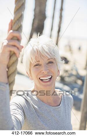 Portrait of enthusiastic senior woman View Large Photo Image Stock Photograph - Portrait of enthusiastic senior woman. Fotosearch