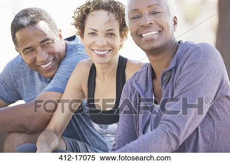 Stock Photography - Portrait of happy senior friends. Fotosearch