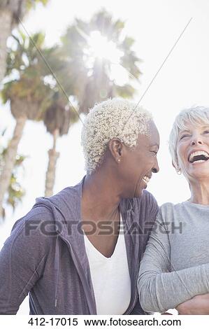 Stock Photography - Senior women laughing. Fotosearch
