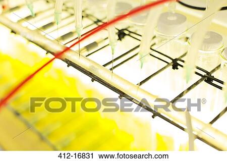 Stock Image - Close up of machinery in science laboratory. Fotosearch
