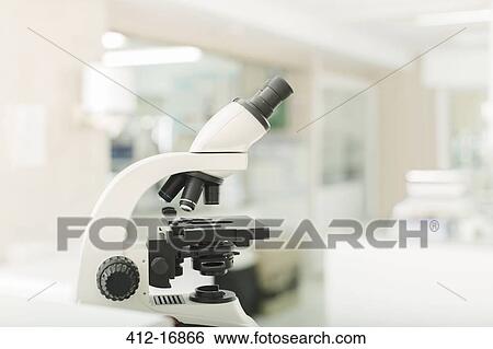 Stock Photograph - Microscope in laboratory. Fotosearch
