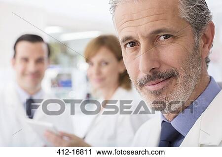 Portrait of confident scientist in laboratory View Large Photo Image Stock Image - Portrait of confident scientist in laboratory. Fotosearch