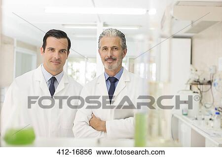 Portrait of confident scientists in laboratory View Large Photo Image Stock Photograph - Portrait of confident scientists in laboratory. Fotosearch