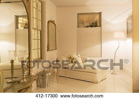 Chaise lounge in luxury sitting room at night View Large Photo Image Stock Image - Chaise lounge in luxury sitting room at night. Fotosearch