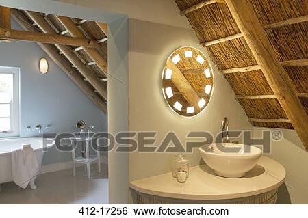 Stock Photograph - Luxury attic bathroom. Fotosearch