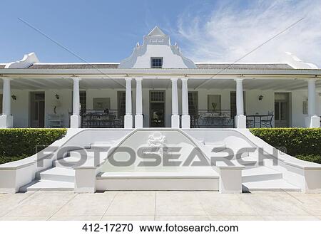 Stock Image - Luxury house with fountain. Fotosearch