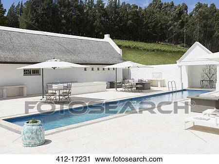 Stock Image - Luxury lap pool. Fotosearch