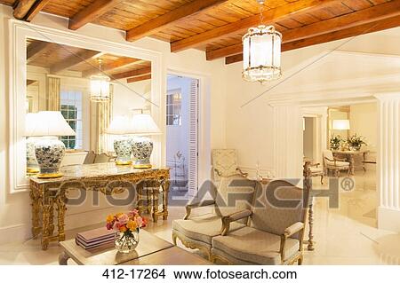 Picture - Luxury living room illuminated at night. Fotosearch